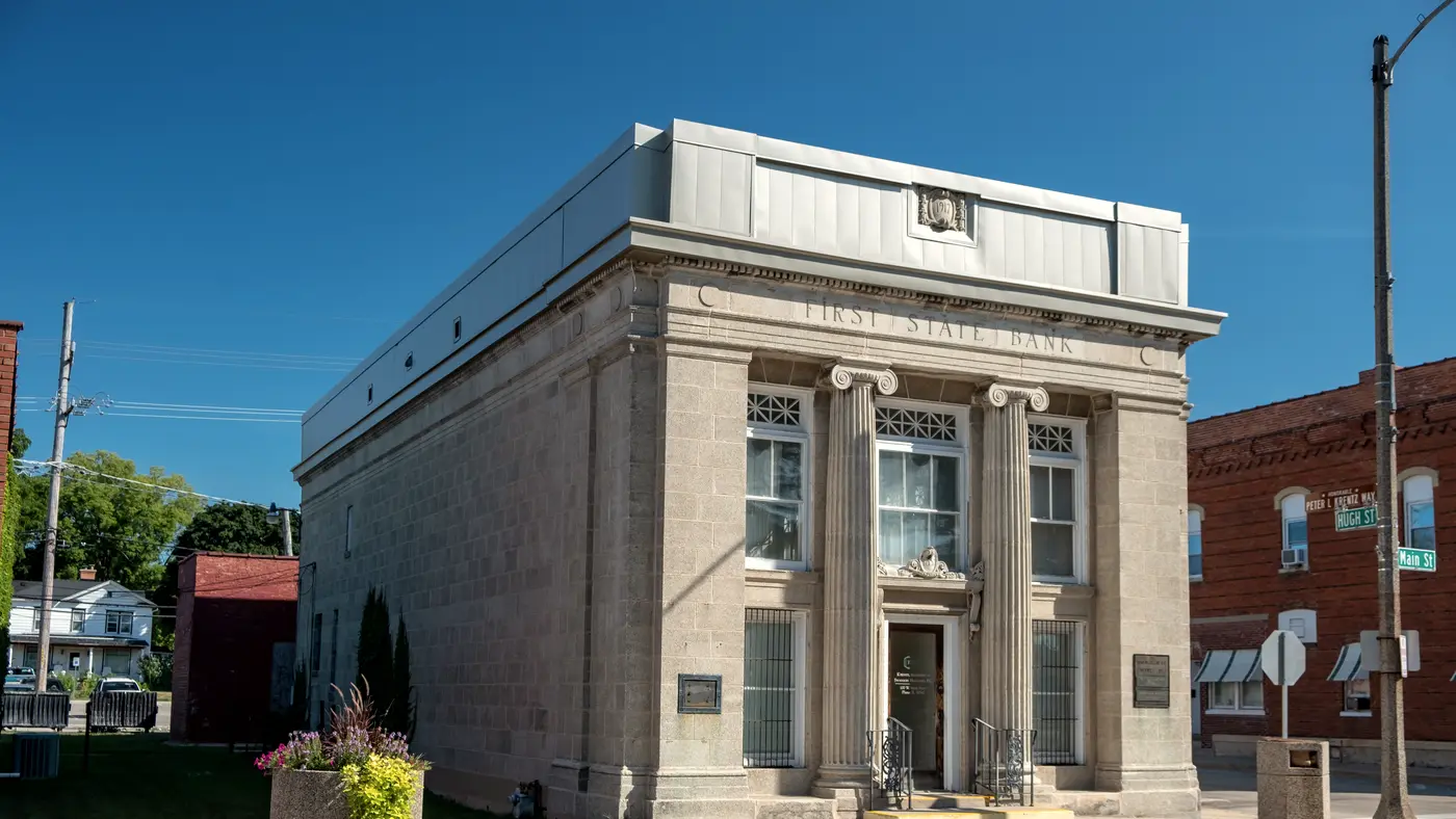 Classical stone bank building on a small-town corner