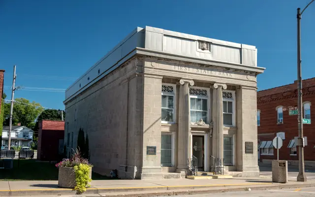 Classical stone bank building on a small-town corner