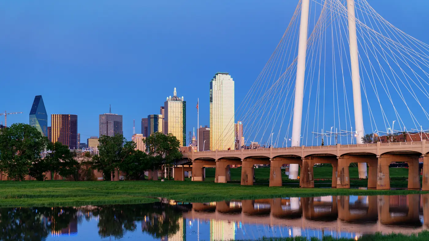 Margaret Hunt Hill Bridge and Dallas skyline reflected in water