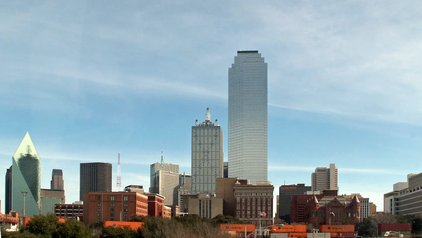 Bank of America Plaza rising over downtown Dallas buildings