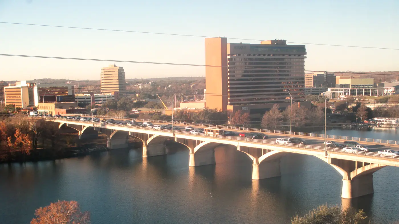 Congress Avenue Bridge spanning Lady Bird Lake toward downtown Austin
