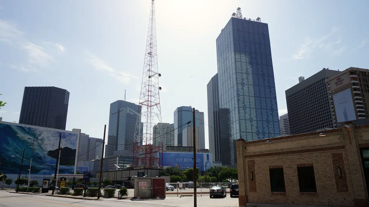 Downtown Dallas street lined with glass office towers