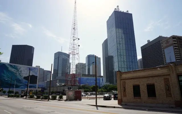 Downtown Dallas street lined with glass office towers