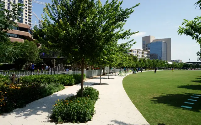 Winding path through the Klyde Warren Park lawn in Dallas