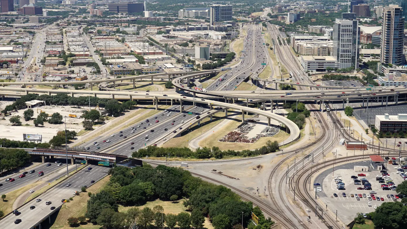 Aerial view of downtown Dallas highway interchanges and rail lines