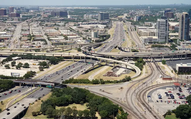 Aerial view of downtown Dallas highway interchanges and rail lines