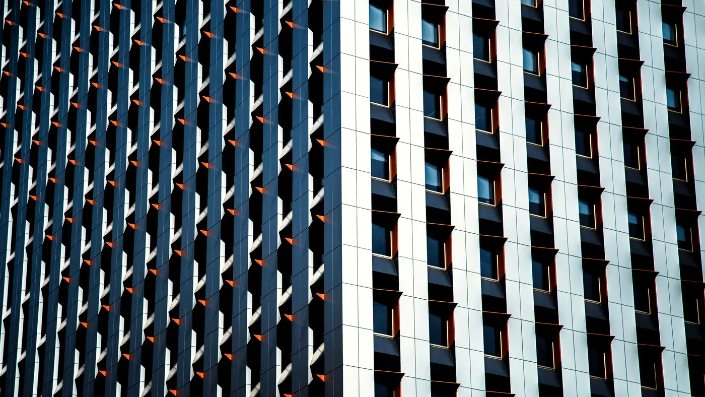 Striped glass and steel facade of a downtown office tower
