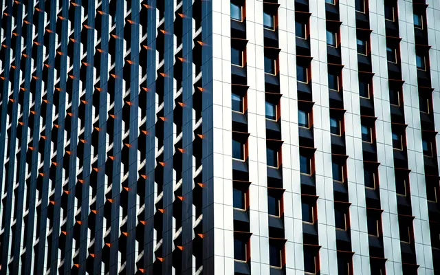 Striped glass and steel facade of a downtown office tower