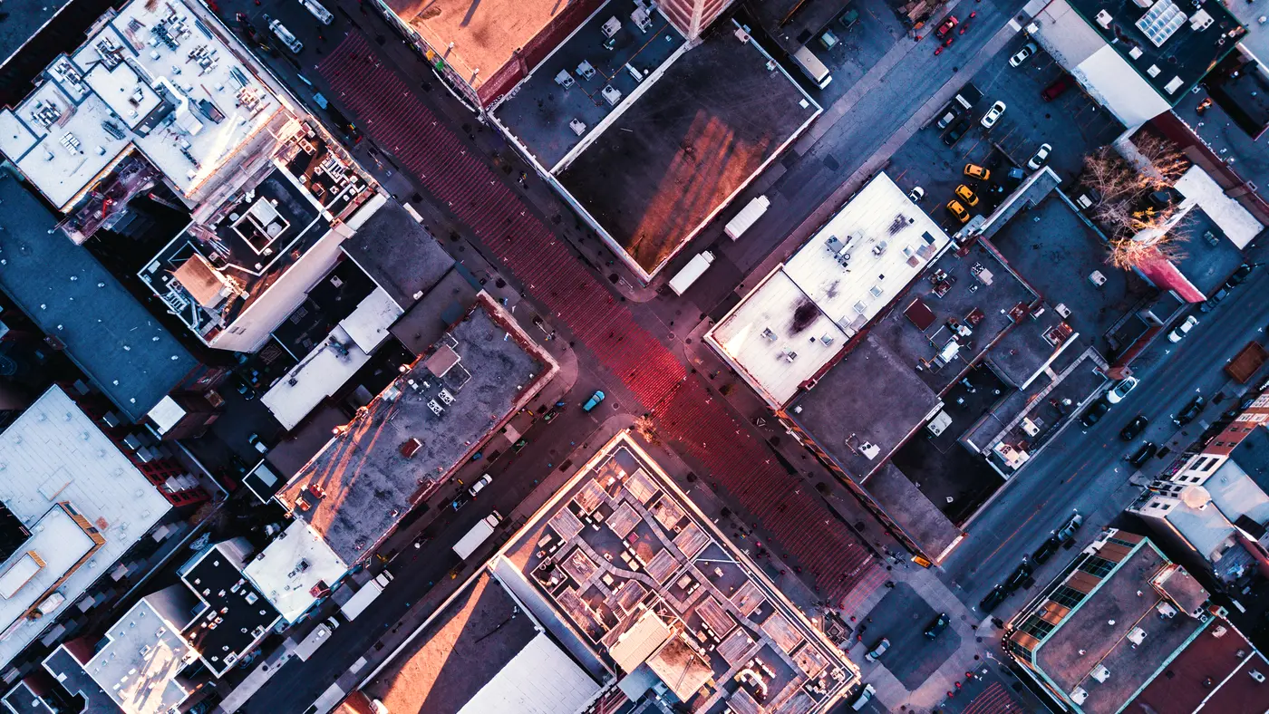 Aerial view straight down onto a downtown street intersection