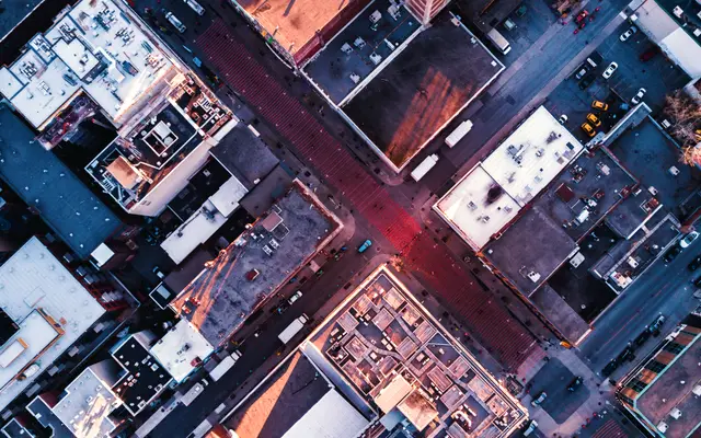 Aerial view straight down onto a downtown street intersection