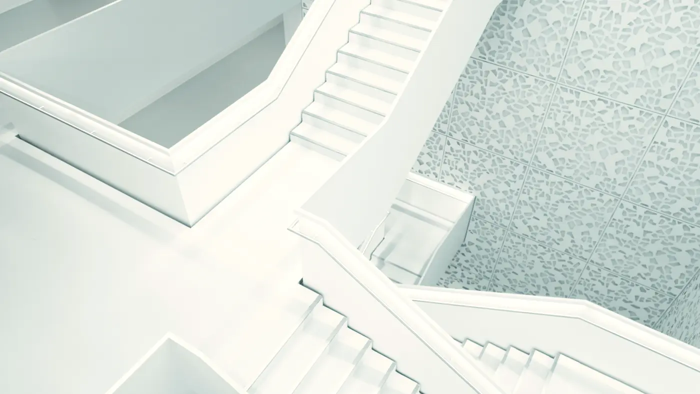 White minimalist staircase and walls seen from above