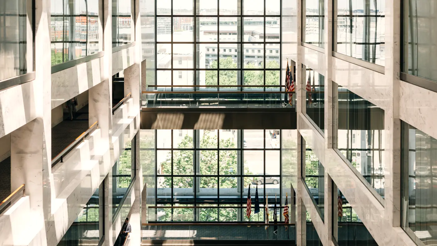Glass and stone atrium inside a modern office building