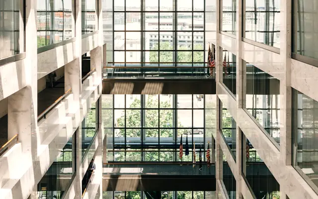 Glass and stone atrium inside a modern office building