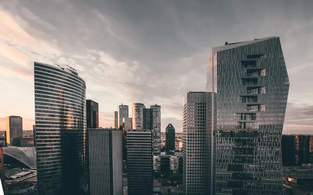 Modern downtown skyline under a cloudy evening sky