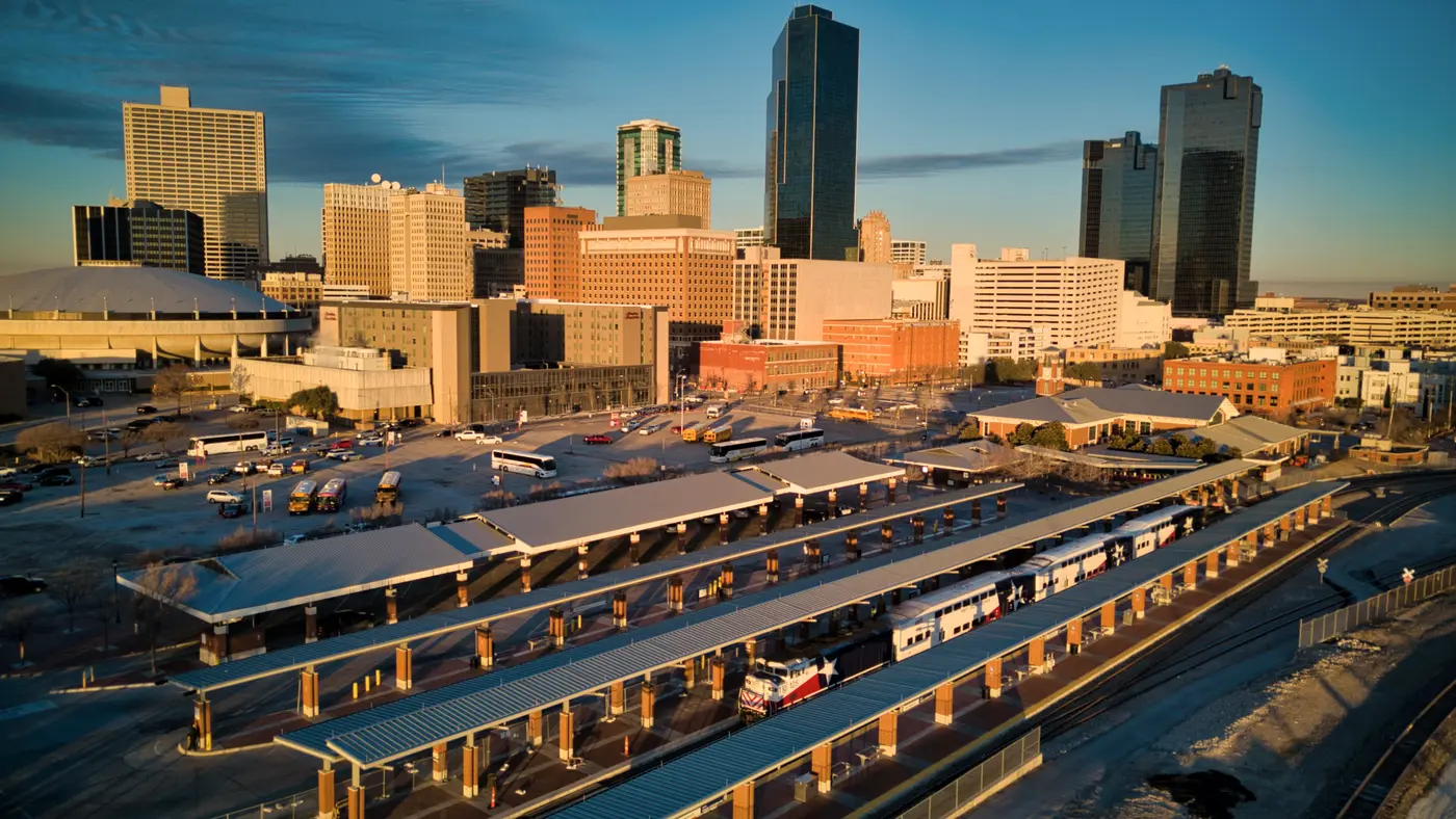 Fort Worth skyline in golden light above the rail station